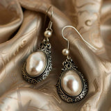 Teardrop Silver Earrings with Inlaid Pearls