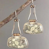Antique-Inspired Earrings Featuring Weathered Gemstones