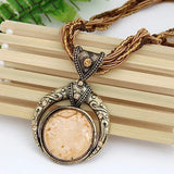 Retro Necklace Featuring an Ethnic Green Crystal Pendant