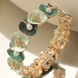 Retro Floral Bracelet Adorned with Green Flowers and Pearls