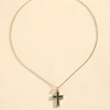 Elegant Gold Necklace Featuring a Majestic Emerald Cross Pendant