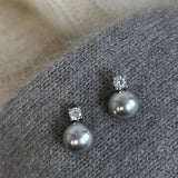 Chic Black Pearl Earrings Adorned with Zirconia