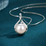 Classic Silver Necklace Adorned with Teardrop Pearls