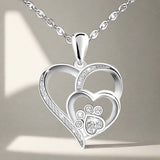 Zirconia-Embellished Silver Necklace Featuring Dot and Heart Design